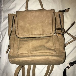 Tan Backpack.